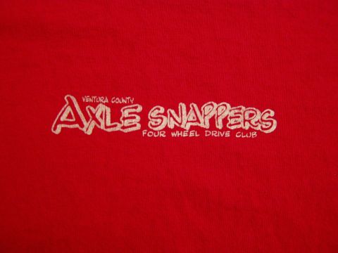 1967 Ford Bronco - This photo shows a red t-shirt with white text for the Ventura County Axle Snappers Four Wheel Drive Club.