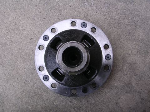 1983 Ferrari Enzo - This is a differential carrier, a component of a vehicle's drivetrain, shown against a concrete surface.