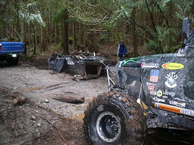 Getting it in position for me to tow it out, Ryan helping w/ the winching