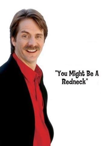 1998 Ford Taurus - Comedian Jeff Foxworthy is pictured next to text that reads "You Might Be A Redneck" and a Supermotors logo.