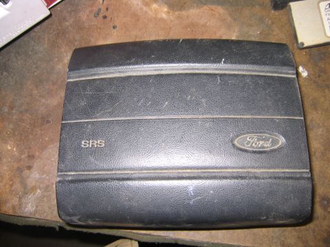 1994 Ford Bronco - This is a Ford airbag cover with SRS text and the Ford logo.