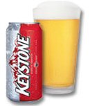 1985 Ford LTD Crown Victoria - A can of Keystone beer sits beside a frothy glass of the same beverage.