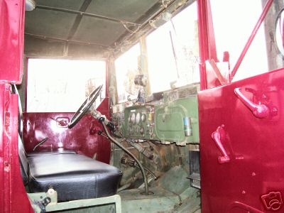 1968 Jeep CJ5 - Interior view of a truck cab, showing the dashboard, steering wheel, and seating area.