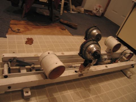 1991 Ford Crown Victoria LTD - This is a close-up view of lighting equipment mounted on a white metal frame.
