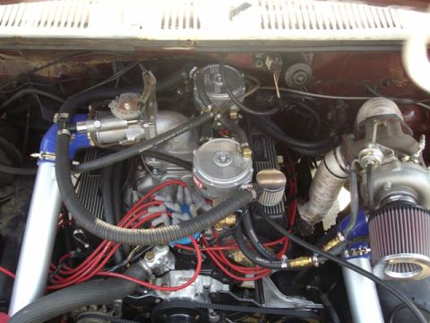 1985 Ford Bronco - Customized engine bay twin turbochargers and modified intake system.