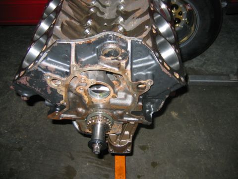 1992 Ford Mustang - Close-up view of an engine block, likely a V8, mounted on an orange engine stand.