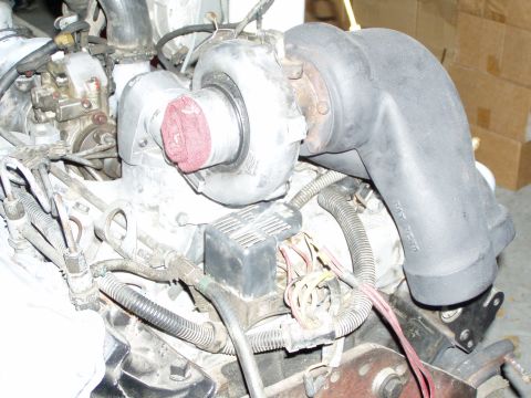 1988 Ford F-250 - ATS Turbo Mounted. red rag in turbo intake.