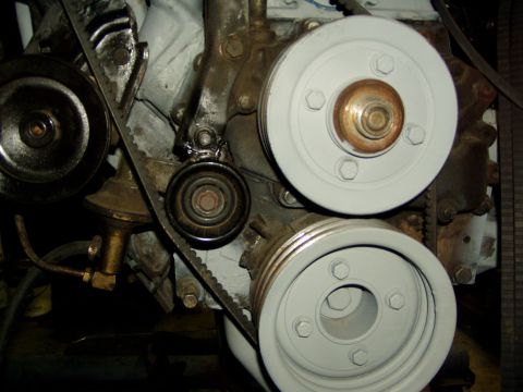 1988 Ford F-250 - This is a Alternator Belt tensioner I added to help 'stabilize' the belt from flapping. Idler came from a '98 Ford Contour and was custom f…