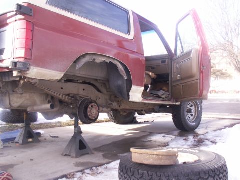 1986 Ford Bronco - This 1986 Ford Bronco is on jack stands with its rear axle removed for service.