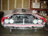 1968 Ford Torino - Front view of a 1968 Ford Torino, showing the grille and headlight area with the hood off.