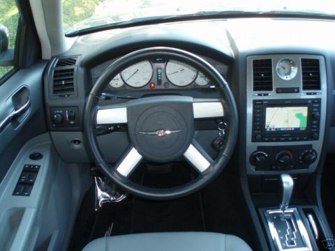 2007 Chrysler 300 - Interior view of a 2007 Chrysler 300, the dashboard, steering wheel, and center console.
