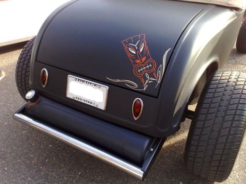 1991 Ford Crown Victoria - Hot rod with tiki graphic and wide rear tires.