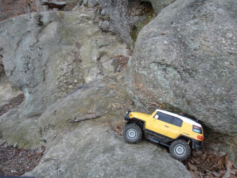 1996 Ford Bronco - A remote-controlled vehicle navigates a rocky terrain.