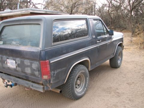 1982 Ford Bronco - This 1982 Ford Bronco is seen from the rear three-quarter angle, parked outdoors.