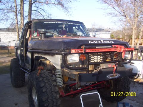 1978 Ford Bronco - This heavily modified SUV features large off-road tires and extensive front-end modifications for extreme terrain.
