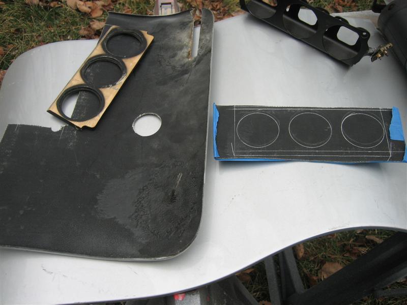 Door panel and gauge cluster housing with cutouts for gauges
