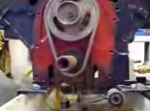 1969 Ford Fairlane - The front of an engine block shows a belt driving the pulleys.
