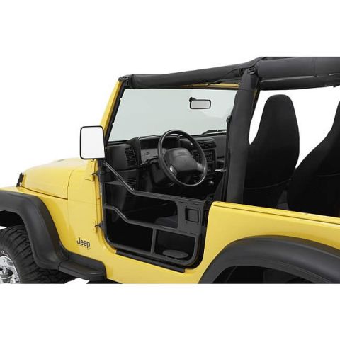 1991 Ford Bronco - Yellow Jeep Wrangler with doors removed, revealing the interior and roll cage structure.