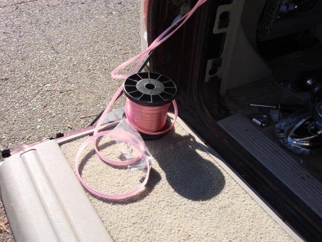 i got some 14AWG monster wire. i only want to do this once. i removed the rear pillar panel and the top steel trim panel. i then looked to see the best way to run the wires and have them out of the way.