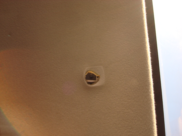 one philips screw and the holder is out. i placed it aside so it can be installed later.