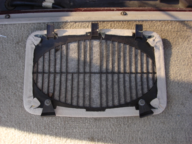 ok-these stock speaker grills have 2 tabs and 2 swivel mounts. you put the tabs into the head liner and then thru the topside of the roof liner you swivel the other two tabs and the cover stays in place.
