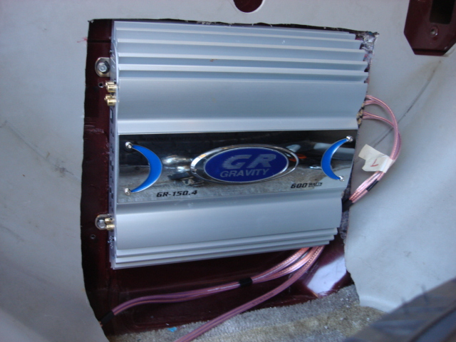 to keep all in some sort of org. i tined the ends of the speaker wires and installed them in the amp. now the rear upper deck speakers are installed and ready for sound.