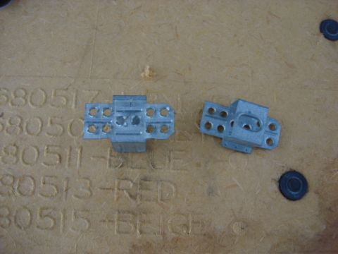 1983 Ford Bronco - here are the brackets. i removed the old glue and door liner. reinstalling is easy line them up where they should be and hot glue them in p…