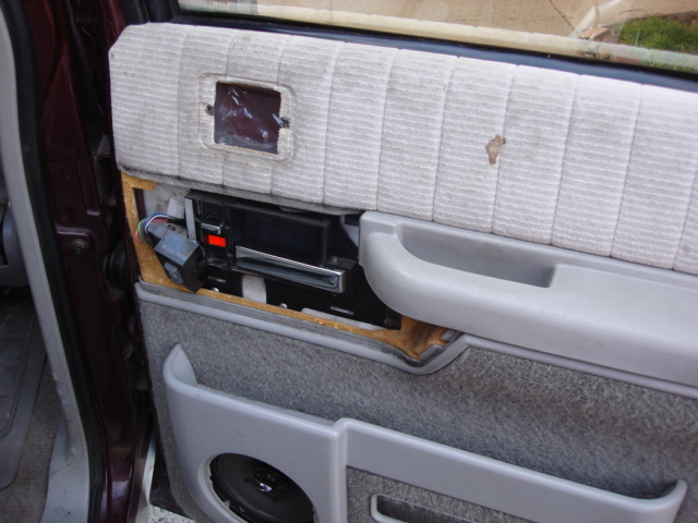 to remove the door panel you remove the 2 ash tray screws. one arm rest screw and pop off the window switch trim.