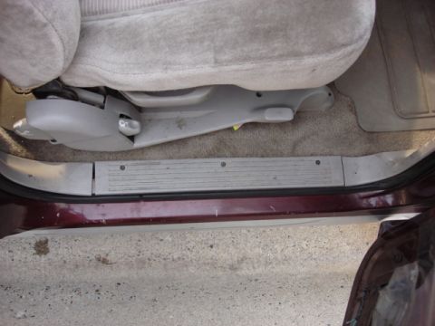 1983 Ford Bronco - ok-another break in the rain. now to run the door speaker wires. this is the door sill and 3 screws the trim is out.