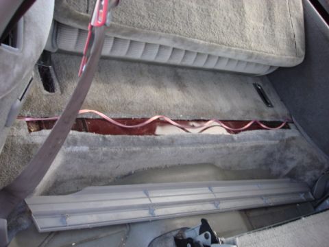 1983 Ford Bronco - there is a trim panel that crosses the rear cargo area. i took the 5 screws out and pulled the cover.