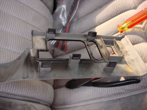 1983 Ford Bronco - here is the switch trim panel. it is held in by 5 friction pins. i used a trim panel and worked them out and the panel came right out.