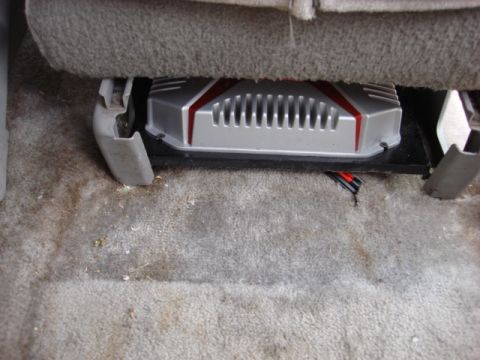 1983 Ford Bronco - i made a small slot in the carpet for the wires. this is only seen with the seat all the way forward and tilted forward.