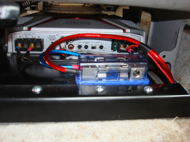 here is the amp all connected and the red is the power to the other amp and remote switch wire.