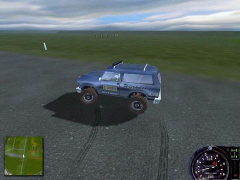 1988 Ford Bronco - Video game screenshot showing a lifted blue full-size SUV on knobby off-road tires from the driver's side, parked on gravel in an open gras…