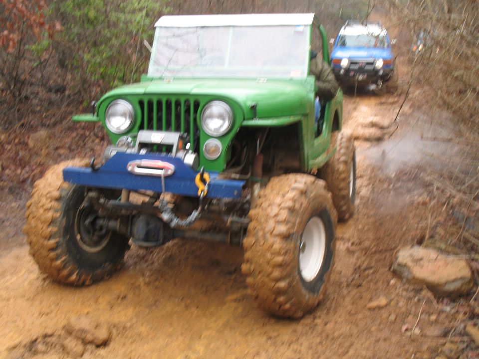 Custom 4 link, what looked like a 350, rear air shocks, etc.