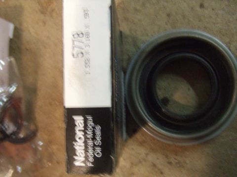 1996 Ford Bronco - Close-up of National Oil Seals packaging and a single seal.
