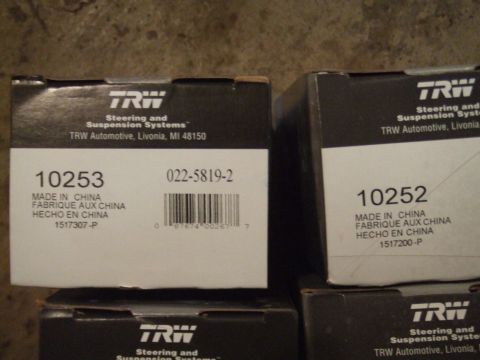 1996 Ford Bronco - Boxes of TRW Steering and Suspension Systems parts are shown, with part numbers 10253 and 10252 visible.