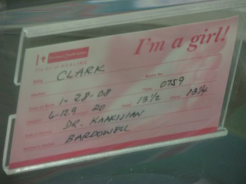 1987 Suzuki Samurai - Photograph of a hospital baby identification card, unrelated to vehicles or technical documents.