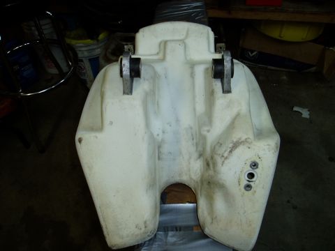 2000 Ford E350 - A white plastic fuel tank is shown from above, with mounting hardware visible.