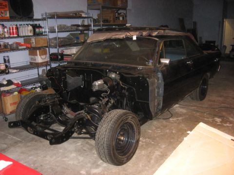 1965 Ford Galaxie - This 1965 Ford Galaxie convertible is in a state of restoration, with its front end disassembled.