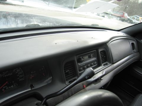 1991 Ford LTD Crown Victoria - The interior dashboard of a 1991 Ford Crown Victoria LTD, the instrument cluster and radio.