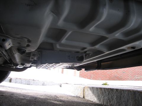 1991 Ford LTD Crown Victoria - Underside view of a vehicle, focusing on the frame and underbody components.
