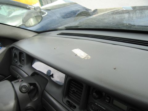 1991 Ford LTD Crown Victoria - Interior view of a 1991 Ford Crown Victoria LTD dashboard, showing the steering wheel and radio.