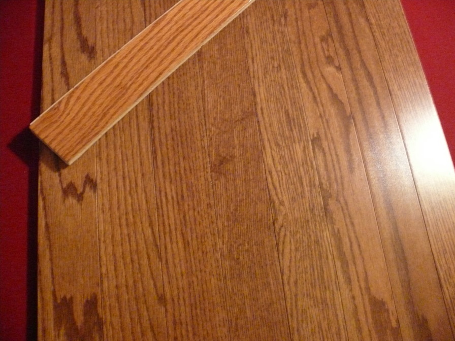 Wood flooring with a trim piece