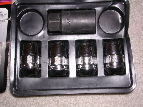 1983 Ferrari Enzo - This is a set of lug nuts and a key for removing them, not a 1983 Ferrari Enzo.