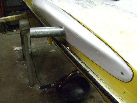 1998 Kawasaki JH1100-A4 1100 ZXi - Close-up of a jet ski hull section undergoing repair or modification.