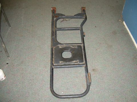 1991 Ford Bronco - This is a spare tire carrier, likely for an older SUV or truck, shown in a neutral setting.