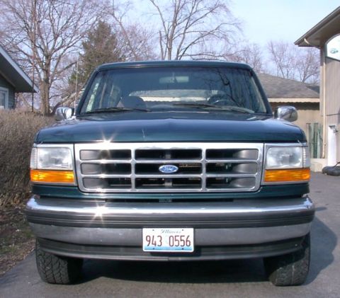1994 Ford Bronco - Front view of a 1994 Ford Bronco, showing its grille and headlights.