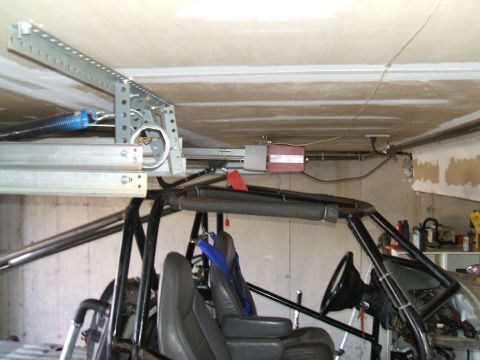 1995 Ford Bronco - Interior view of a vehicle with a prominent roll cage and bucket seats, possibly undergoing a rebuild.