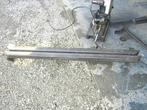 1978 Ford Bronco - Metal sliders and a chop saw are visible in this outdoor workshop scene.